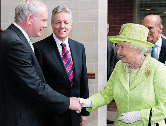 McGuinness and the Queen shake hands in Belfast, July 2012.
